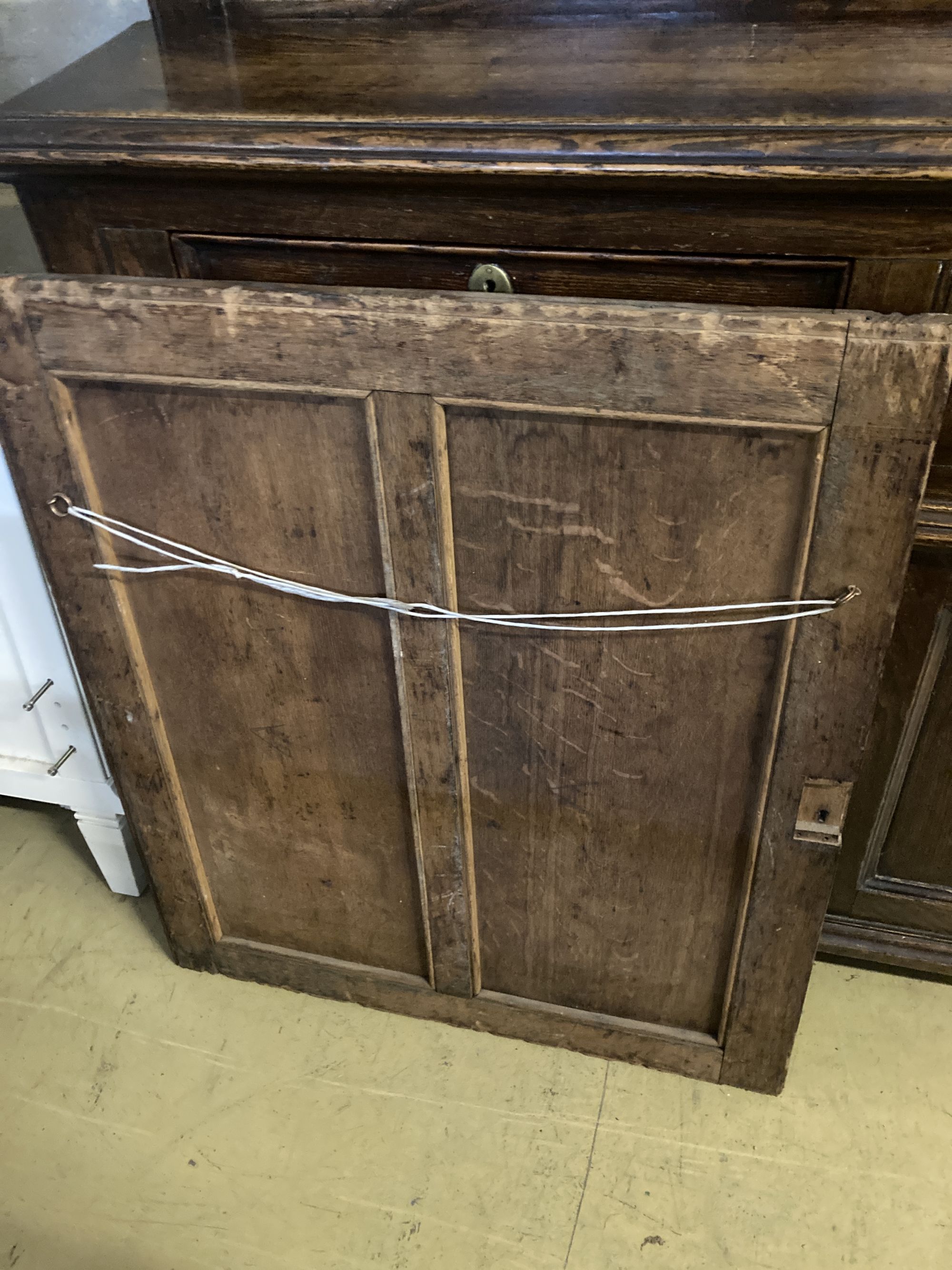 A late 19th century carved oak panel, width 72cm height 84cm